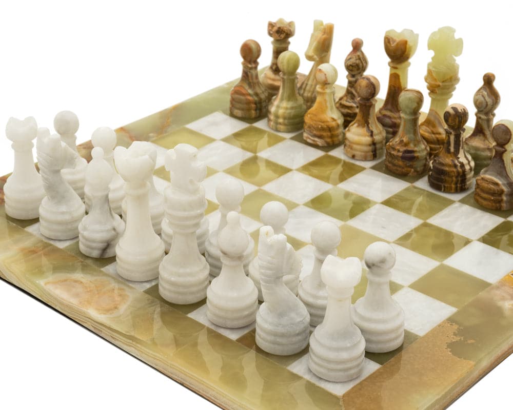 The Alghero Onyx and Marble Chess Set featuring intricate white and brown chess pieces on a matching board.