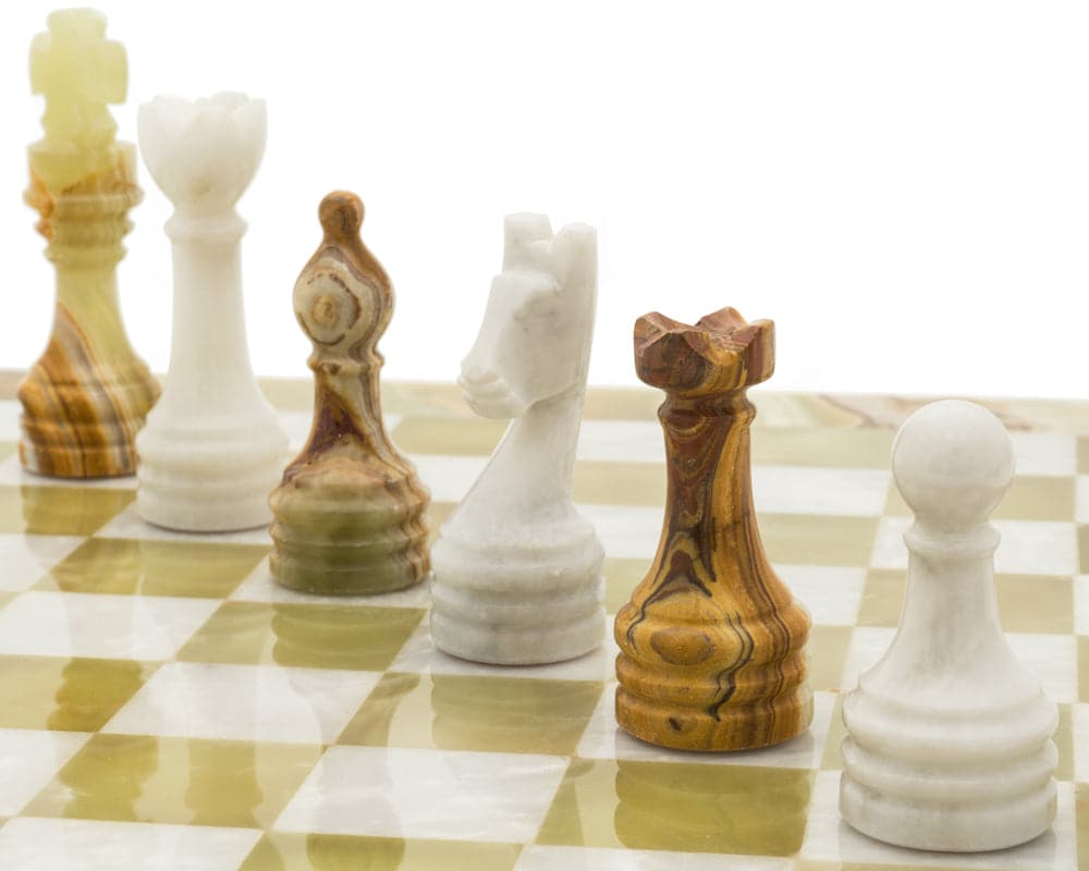 Alghero Onyx and Marble Chess Set with intricate pieces on a checkered board