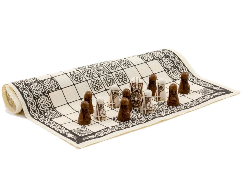 Viking Game Hnefatafl set with wooden pieces on linen playing surface from National Museum of Scotland