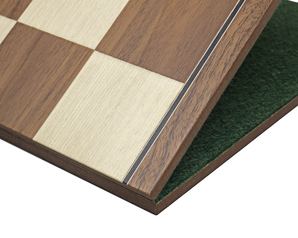 16.75 inch folding walnut chess board with maple squares, billiard cloth base, and ebonised border, crafted in Spain.