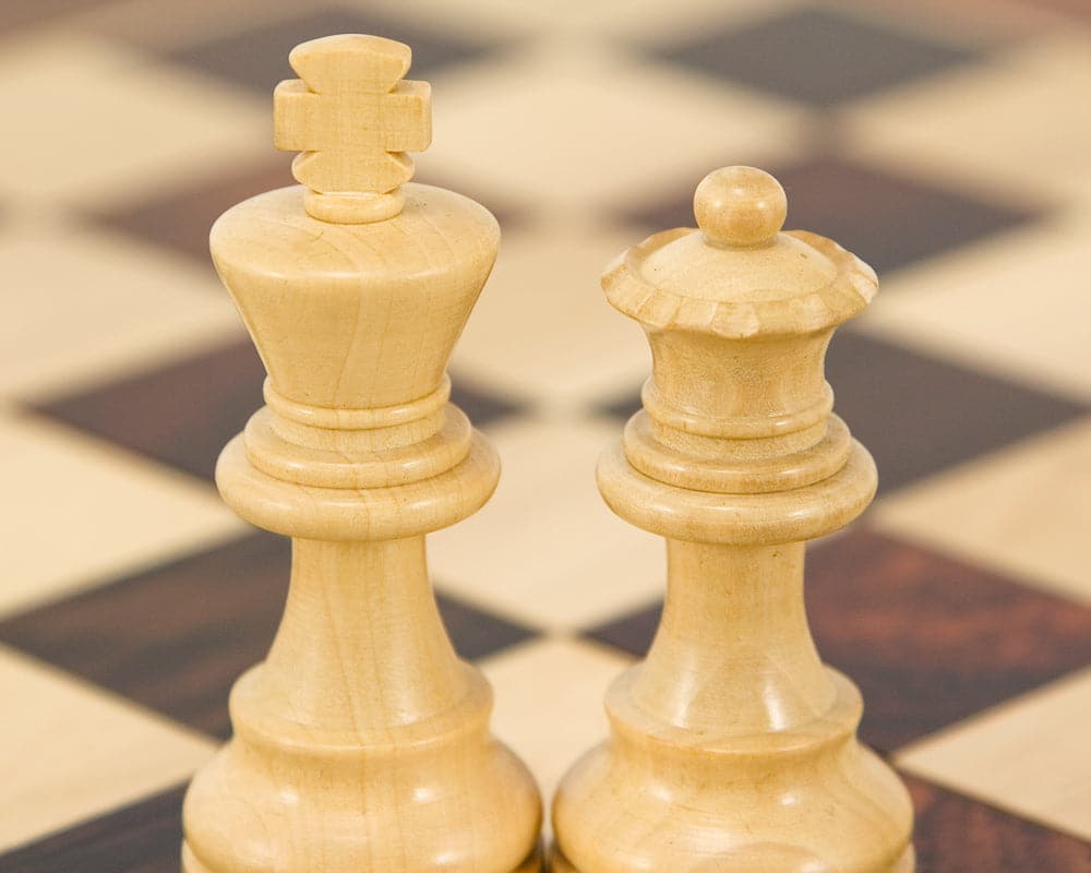 French Knight Series Ebonised Staunton Chess Pieces on chessboard, 3.25 inch king, classic Staunton design, expertly turned boxwood chessmen