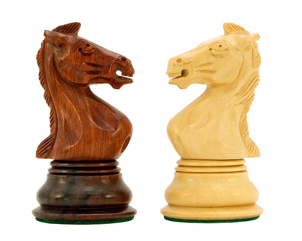 Rosewood and boxwood knights from Madrid Series Luxury Chess Pieces, showcasing elegant craftsmanship and intricate carving.