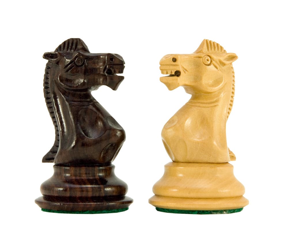 Rosewood and boxwood knight pieces from the Sicilian Series chess set, classic Staunton design, crafted for perfect balance.