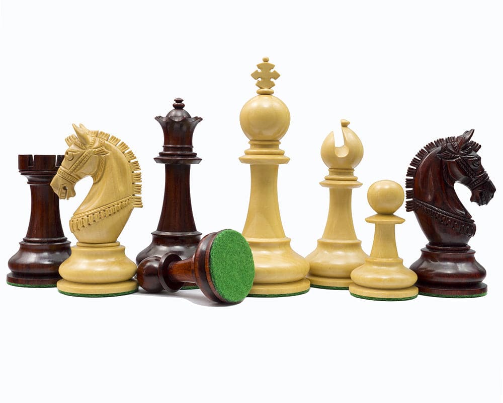 The La Valletta Redwood Chessmen set with 4.5 inch king and detailed knights, ideal for 21 inch board, includes certificate of authenticity