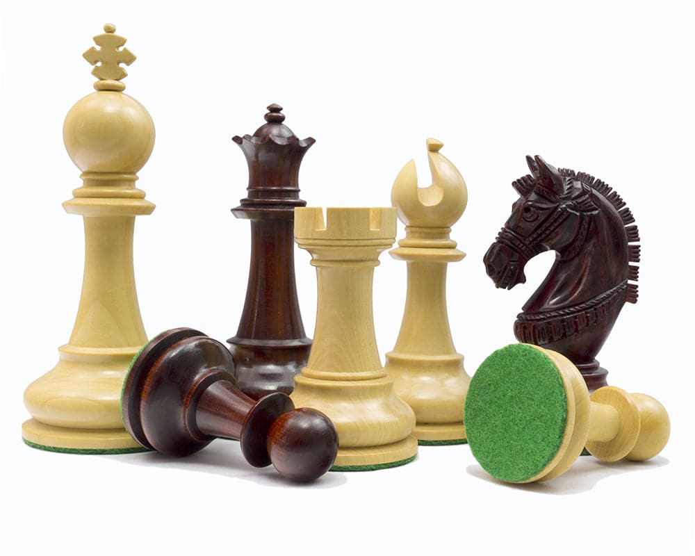 The La Valletta Redwood Chessmen featuring intricately designed pieces including a detailed knight and 4.5 inch king, ideal for 21 inch board.