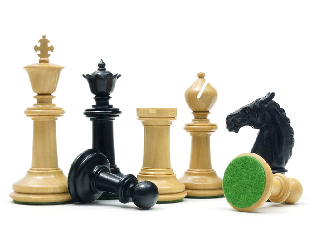 Traditional Staunton Ebony and Boxwood Chessmen - 3.75 inch luxury hand-carved pieces with felted bases and exquisite detailing.