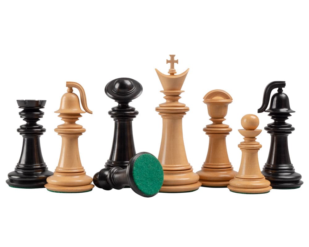 The Greek Staunton Ebony Series chess pieces made from acacia, featuring large, weighted, felted pieces with a 4 inch king and additional queens