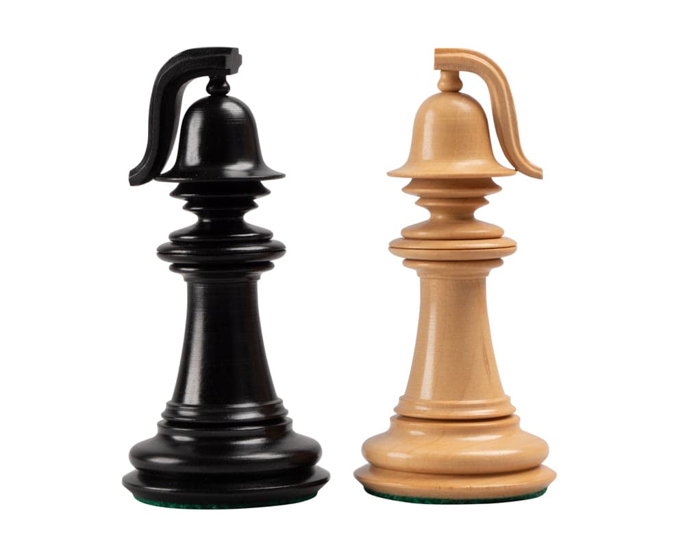 Black and white Staunton-style chess king pieces from The Greek Staunton Ebony Series, crafted from acacia wood.