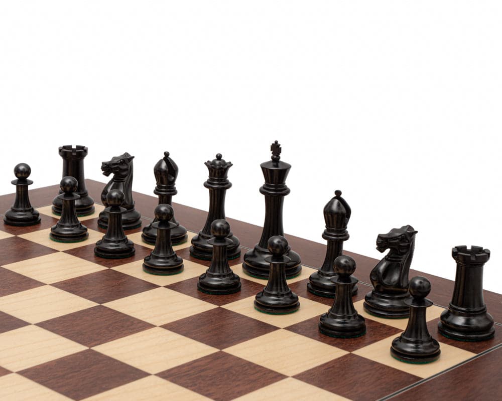 The 1853 Paulsen Reproduction 3.5 inch Chess Men in Ebony displayed on a wooden chessboard