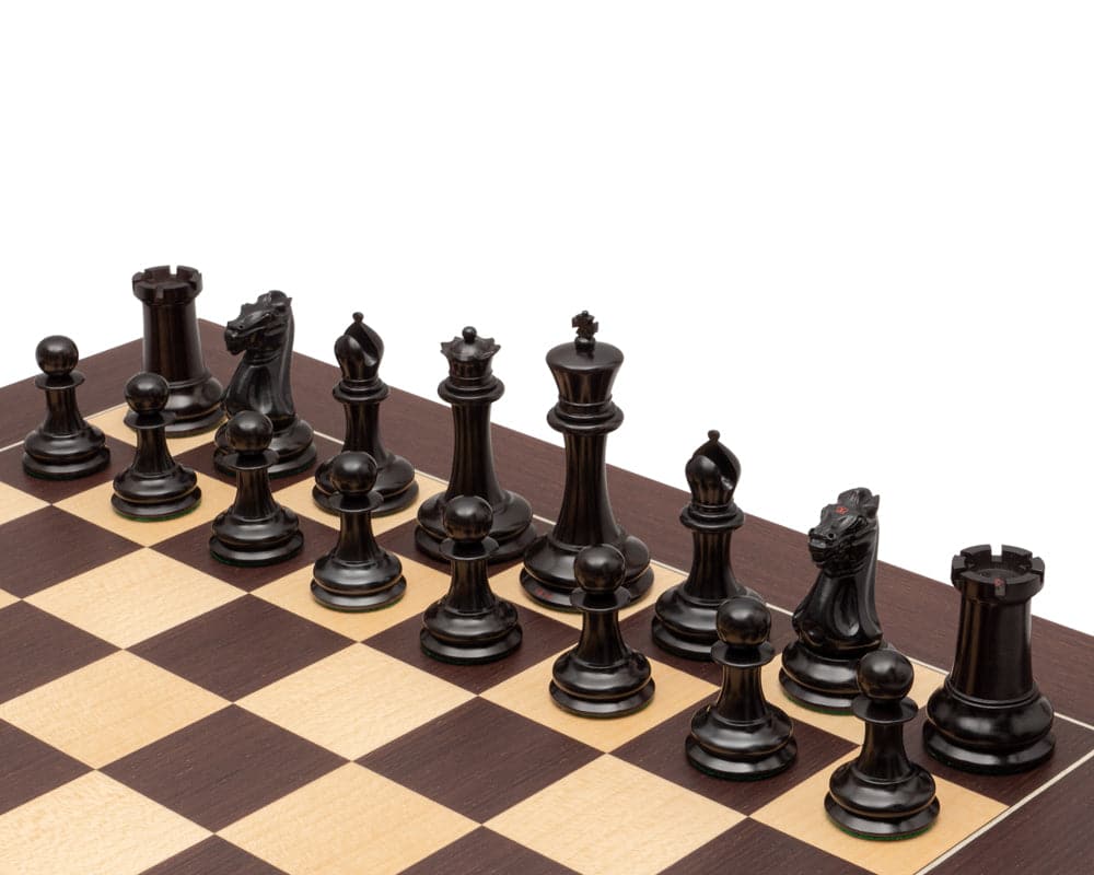 Handcrafted ebony Staunton chess pieces on Italian dark walnut board