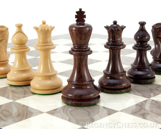 Atlantic Rosewood and Ash Burl chess set with handcrafted pieces and weighted bases on a grey ash burl board.