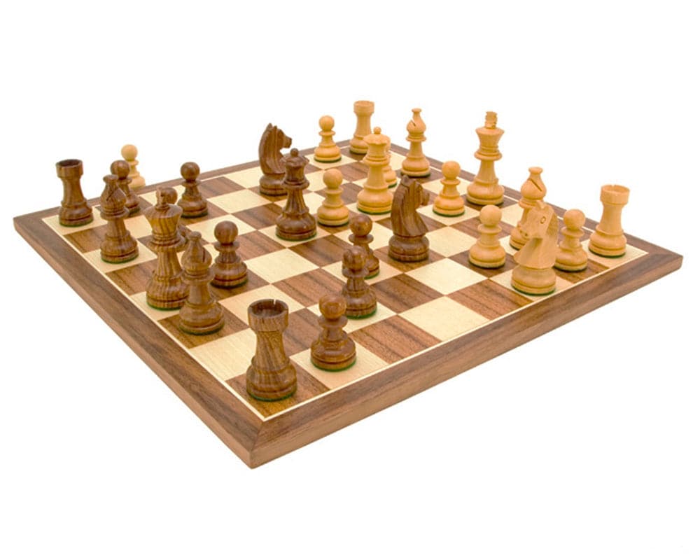 Down Head Knight Academy Small Chess Set with 2.5 inch Ebonized Staunton chessmen and walnut board displaying the pieces in play.