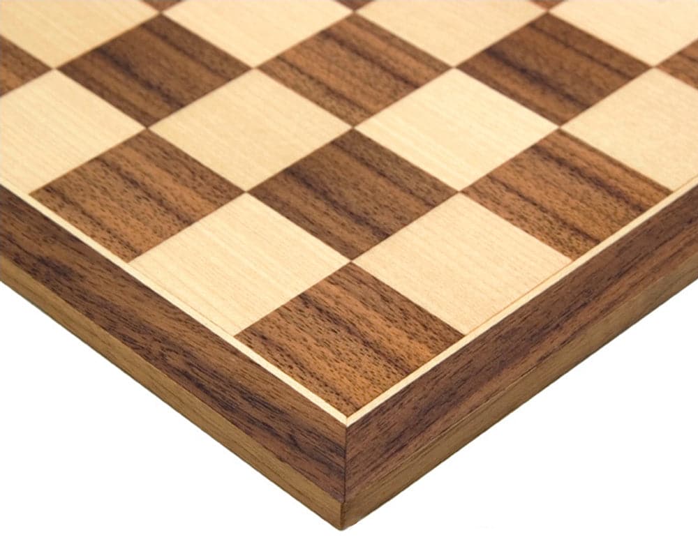 Close-up of walnut chess board with rich yellow-brown tones, part of the Down Head Knight Academy Small Chess Set with Ebonized Chessmen.