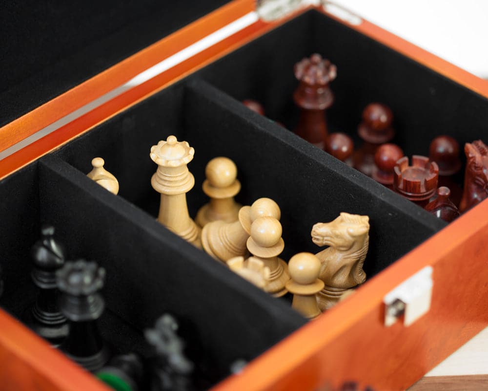 Handcrafted Madrid Tres Corone Ebony, Padauk and Walnut Chess Set in burl effect case with ebony and boxwood chess pieces