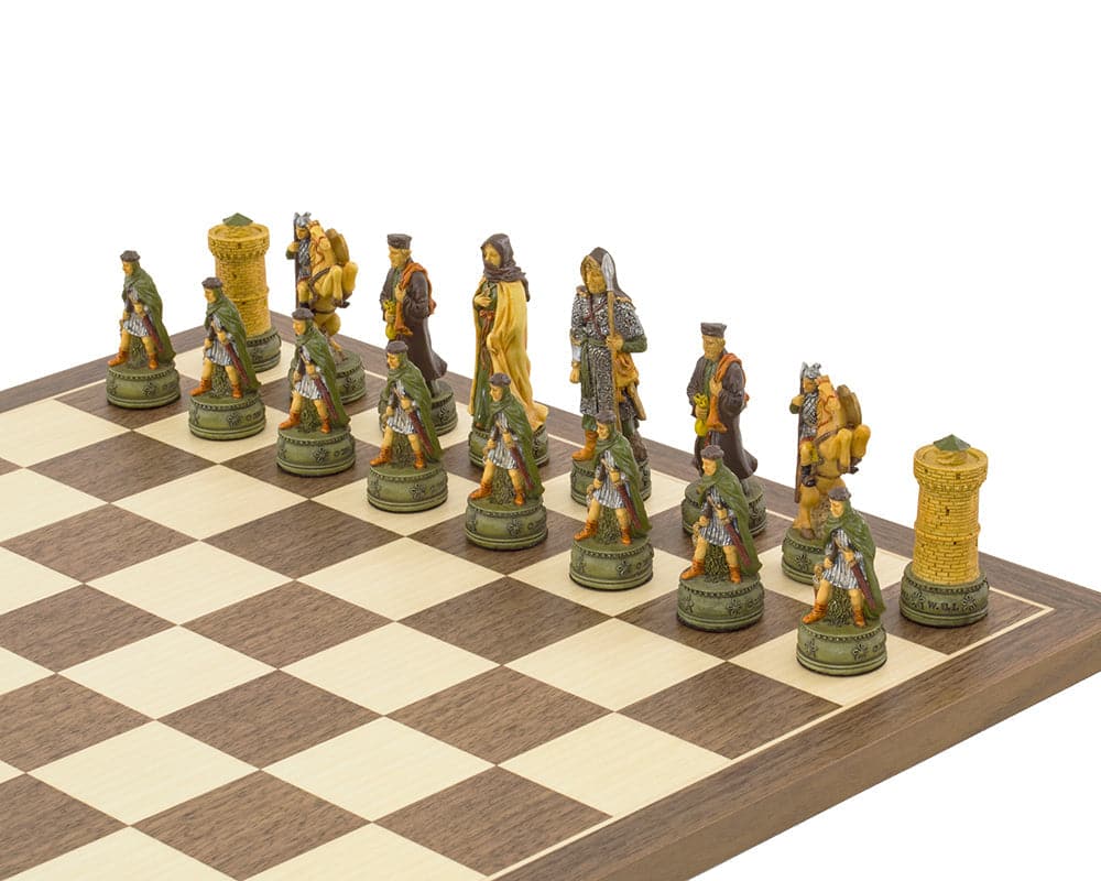 The Camelot Hand Painted themed Chess Set by Italfama with intricately designed, colorful chess pieces on a wooden chessboard.