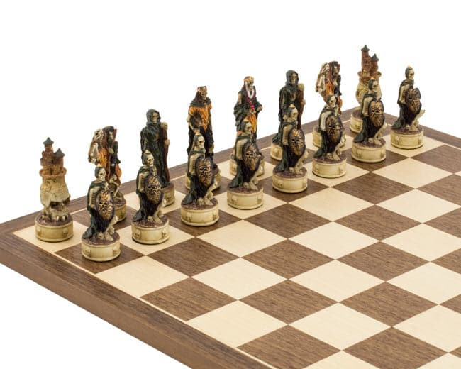 The Zombie Hand Painted Chess Set on a 16 inch wooden board with intricately designed zombie-themed chess pieces crafted in Italy.