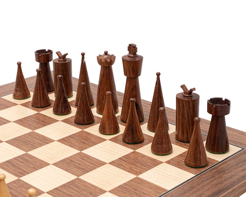 The Art Deco Sheesham and Walnut Chess Set with contemporary rosewood pieces on a walnut and maple board