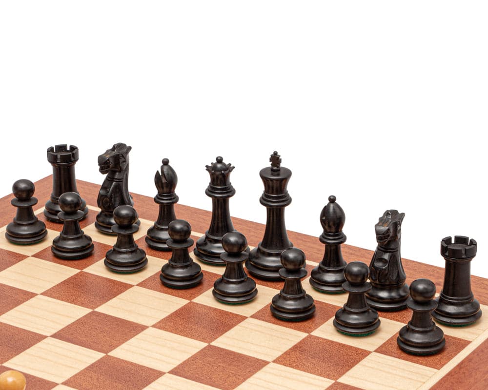 The Warwick Black and Mahogany Chess Set with beautifully carved Staunton pieces on a 15.75 inch mahogany board.