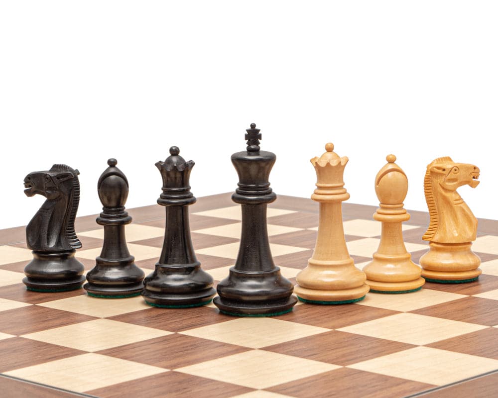 The Warwick Grand Black and Walnut Chess Set with boxwood Staunton pieces on a 17.75 inch Spanish board featuring Walnut and Maple squares.