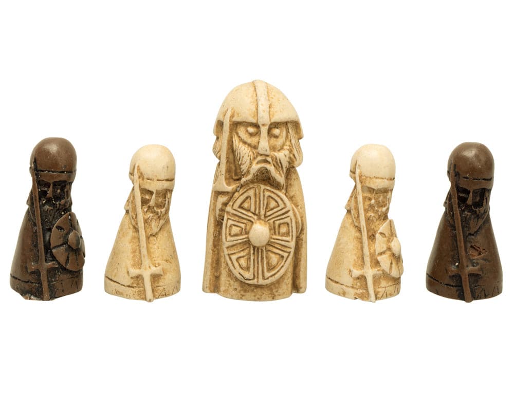 Intricately designed Hnefatafl Viking game pieces in beige and brown, featuring detailed warrior figures with shields and helmets.