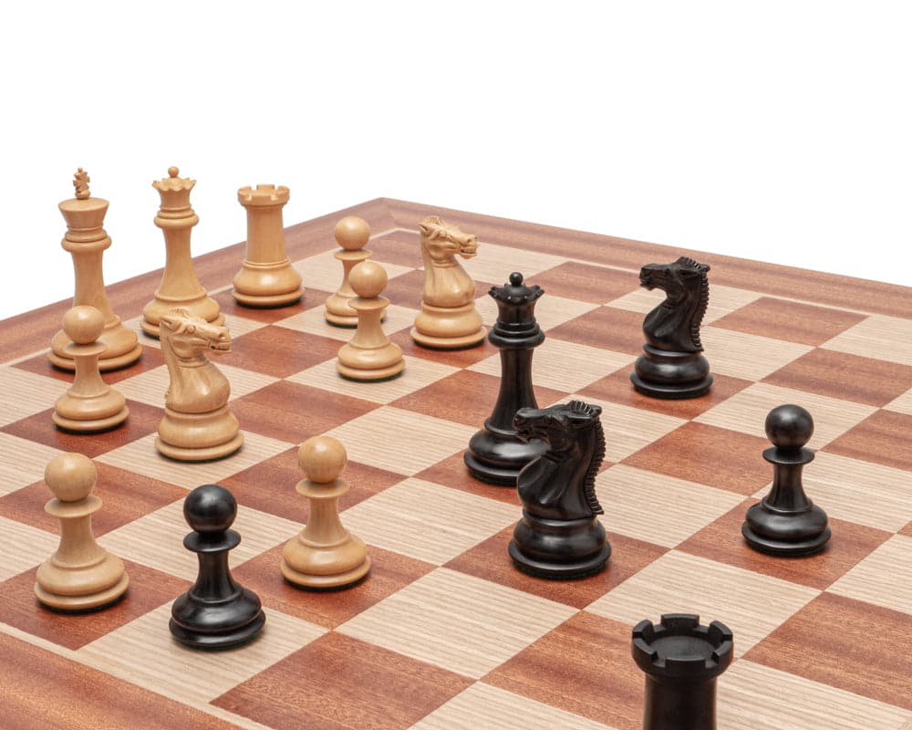 The Sovereign Black and Mahogany Staunton Chess Set on a beautifully crafted board with classic Staunton design and ebonised boxwood pieces.