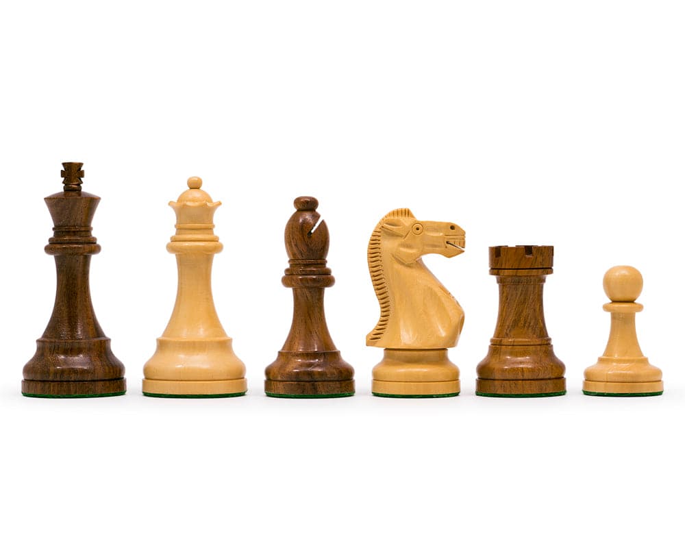 Handcrafted teak and palisander chess set pieces including 3.25 inch king, queen, bishop, knight, rook, and pawn on white background