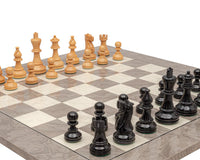 The Atlantic Black and Ash Burl Chess Set with Boxwood Pieces on Grey Ash Burl and Maple Board.